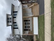 Color photo of front, exterior of house