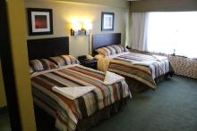Interior shot, double room, date unknown. Photo courtesy of HotelsofNewYorkCity.net.