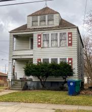 Color photo of front, exterior of house