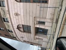 Color photo of hotel exterior